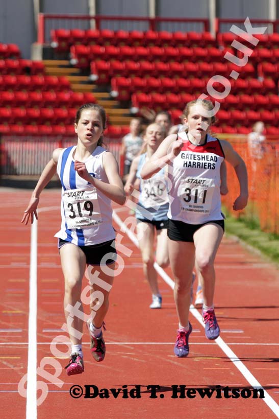 Lucy-Erin Hunter (Darlington) beats Ellie Mahon (Gateshead) in the under-15s 800 metres.